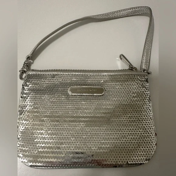 Michael Kors Silver Clutch with Shimmering Finish - Picture 1 of 3